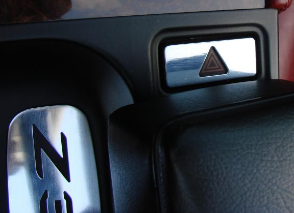 Hazard warning light switch, trim cover