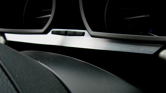 1 decorative trim piece below the speedometer
