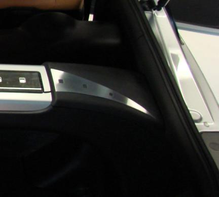 2 decorative trim pieces on either side of the dome brace