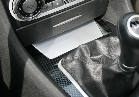 Storage compartment trim