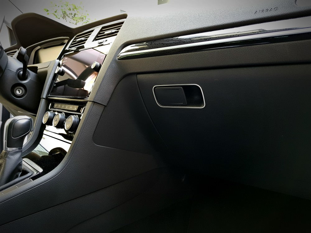 07. Decorative trim for glove compartment handle