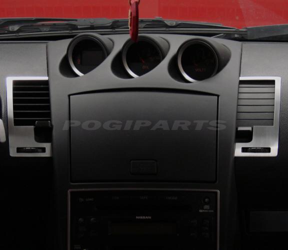 2 decorative trim pieces for center air vents