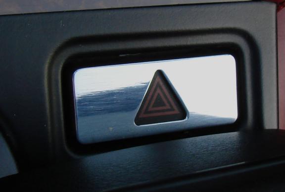 Hazard warning light switch, trim cover