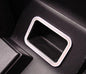 Storage compartment between the seats, frame