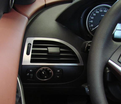 Decorative trim for right and left air vents