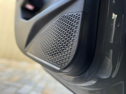 10a. Decorative trim for rear door speakers