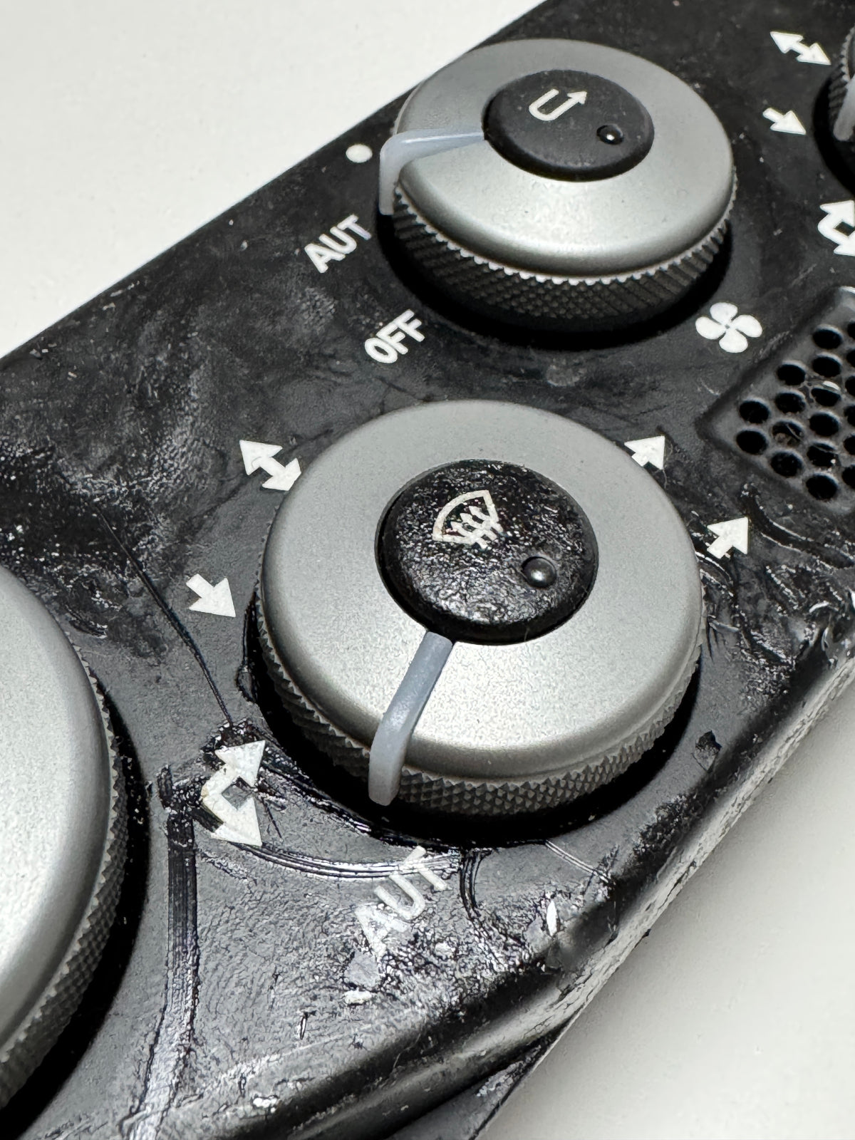 Soft-touch coating restoration for climate control panel