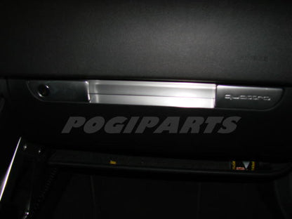 Glove box trim piece