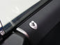 Decorative trim around door hinge pins