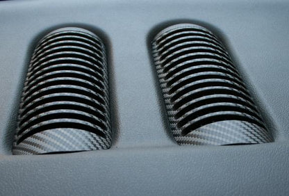 Carbon-look coating for center air vents