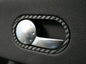 Carbon-look coating for the door openers