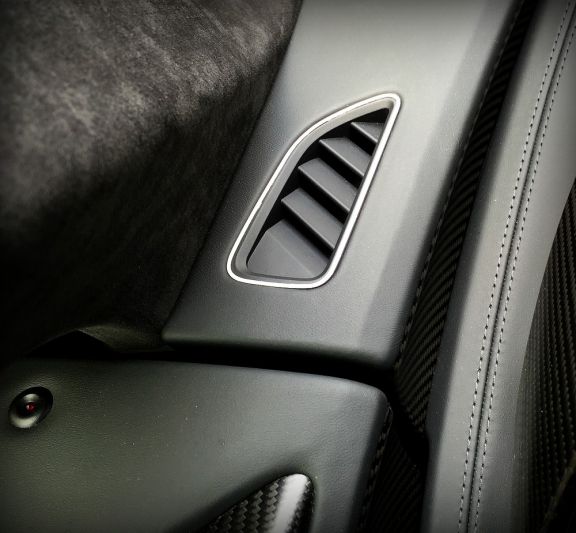 2 decorative trim bezels for defroster vents