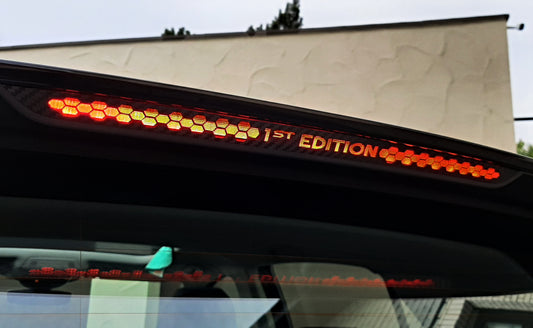 14. Aufkleber mit Schriftzug Bremslicht